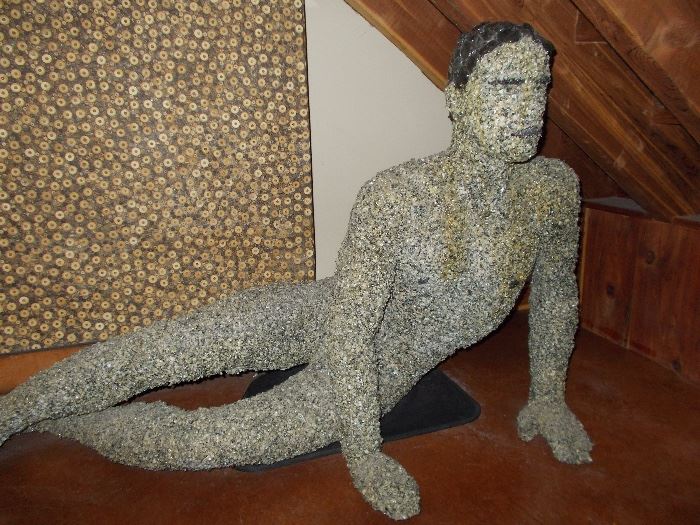 One of a kind piece done by Charlotte Lucas in New Mexico. Stone covered mannequin.