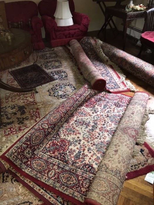 Many handmade antique and vintage rugs