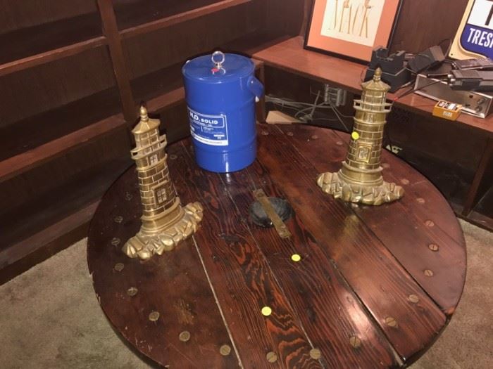 Ships door coffee table an bronze lighthouse bookends.