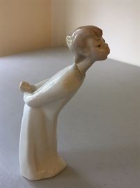Lladro kissing boy