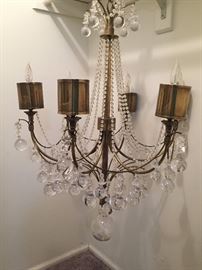 Beautiful brass and glass chandelier.  Crystal balls are solid glass