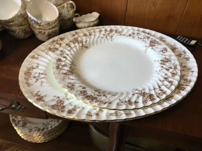 Gold Ancestral Minton, Includes Large Meat platter, Large round serving dish, Service for 12 Dinner plates, Salad plates, Dessert plates, Cups and saucers Creamer and Sugar