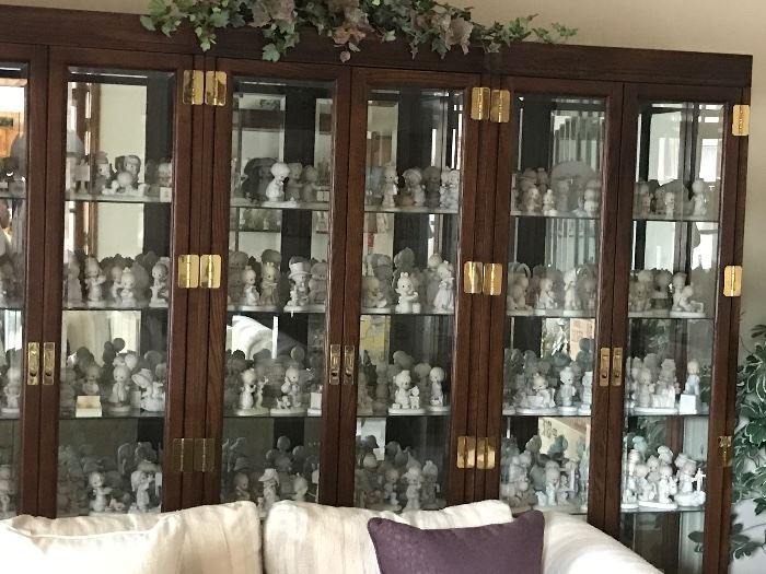 3 matching curio cabinets full of precious moments