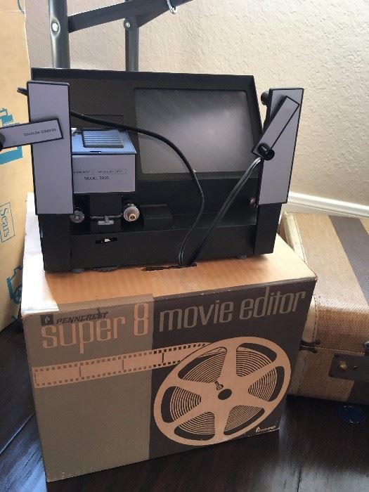 COOL RETRO MOVIE EDITOR.  We also have a pull down stand up screen for viewing.