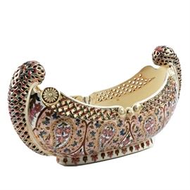 19th-Century Fischer J. Reticulated Ceramic Centerpiece Bowl: A 19th-century Fischer J. ceramic centerpiece bowl, Budapest, Hungary. Hand painted with polychrome enamel and gilt decoration featuring floral and boteh motif with a painted interior floral scene. Reticulated godrons scroll up either side of the horizontal with a reticulated and embossed collar. Marked to the underside of the footed base with a cobalt stamp and impressed mark.