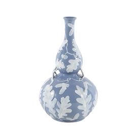 Herend Porcelain Double Gourd Vase: A Herend porcelain double gourd vase. Designed with embossed oak leaf and branch design having pierced twig designs on either side. Acorns fill the spaces in between the lively leaves. Decorated with a cornflower blue glaze and semi-opaque white glaze on the leaves and branches. Marked to the underside with a blue Herend stamp and impressed mark.