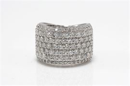 18K White Gold 3.21 CTW Diamond Band: A wide white gold shank enhanced by rows of pave’ set round cut diamonds mounted east to west.