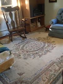 Solid rocker & room size Aubusson rug.