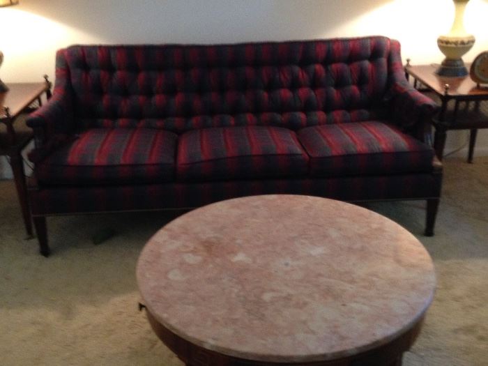 Couch was recently reupholstered; round marble top coffee table.
