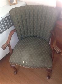 Upholstered chair worn