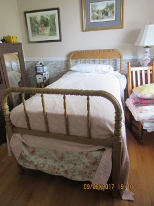 Maple twin bed.  Print on wall is of colonial family and the one on the left is a Southern family.   