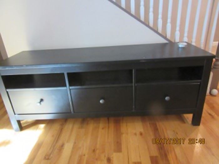The low chest has 3 drawers and could accomadate a large tv. 