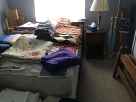 There are a lot of nice linens: quilts that need a little TLC, towels, sheets, table cloths, and more