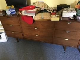 A dresser with a 19" flat screen and other finds.