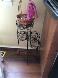 A nice metal plant stand.