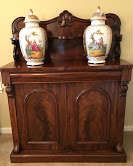1800's Flame Mahogany Server Chiffonier with Pair of Continental Urns, White Ground and Courtly Scenes