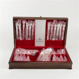 International Silver Co. Deep Silver "Countess" Flatware Set: An International Silver Co. deep silver flatware set in the Countess pattern. This eighty-three piece silver plated set features a floral pattern and is marked “International Deepsilver” on each piece. The collection includes forks, knives, spoons and serving pieces. The collection is presented in a wooden case lined with red felt.