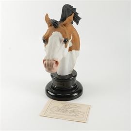 Carlos Estevez Hand-Painted Cold Cast Sculpture "Lightning": A limited edition hand-painted cold cast sculpture by Carlos Estevez titled Lightning. It depicts the head of a brown and white pinto horse with it’s mane flying as if the horse were running. It is signed and numbered 167/350 to the underside and mounted on a black marble base. A signed Certificate of Authenticity is included.
