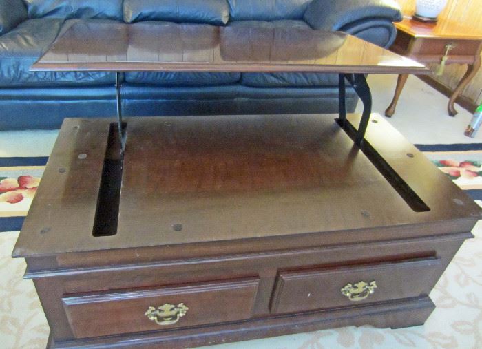 Coffee table with lift top table raised