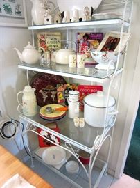Bakers rack with a variety of kitchen items