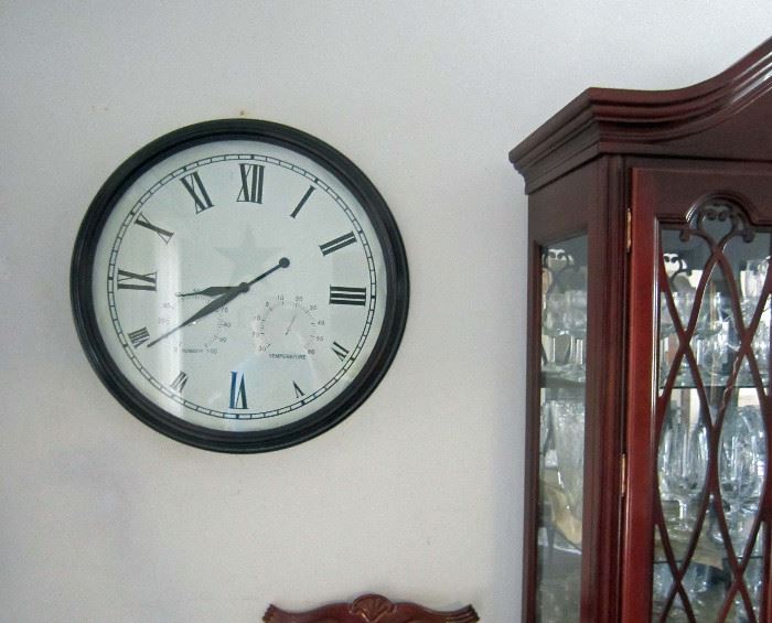 Large decorative battery operated wall clock with temperature and humidity dials 