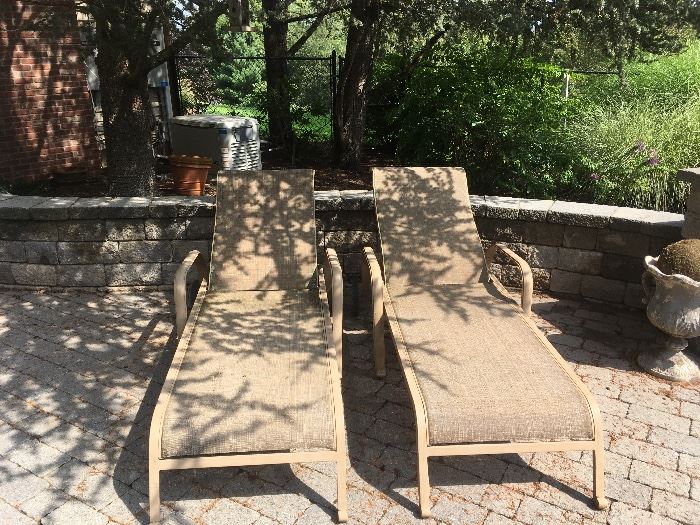 2  outdoor lounge chairs, with wheels. $50.00