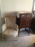 Classic low lounge chair and gorgeous antique tv cabinet