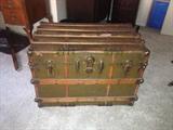 Great condition trunk, perfect for keeping your cashmere sweaters or any item you treasure in great condition and out of your closet for the summer! Also a beautiful antique piece.