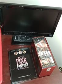mini flatscreen tv, "Pink Panther and "Rocky" DVD box sets     LIVING ROOM