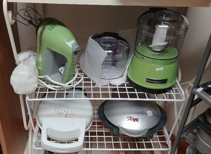Kitchen Aid hand mixer and attachments; Kitchen Aid mini food processor; waffle maker; grill     LAUNDRY ROOM