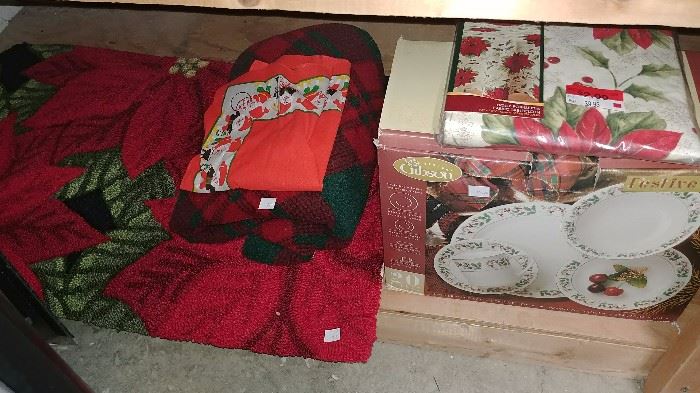 Christmas dishes in box, table cloths, rug, etc.     GARAGE