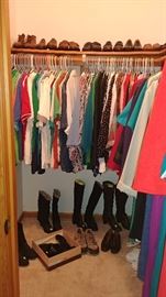 closet full of clothes, shoes, and boots     BEDROOM