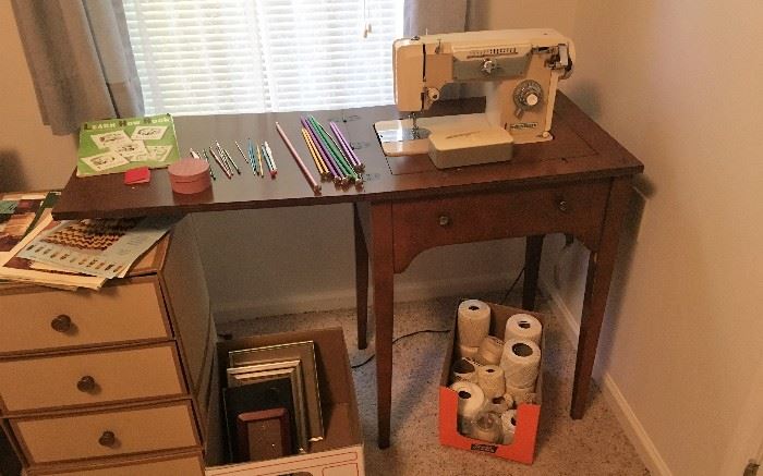 Dressmaker sewing machine and cabinet