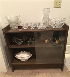 vintage display shelf with sliding doors