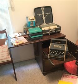 antique desk, Smith-Corona manual typewriter and American Flyer toy cash register