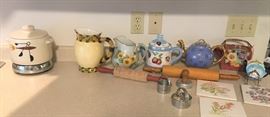 ceramic pitchers and teapots, wooden rolling pins and vintage West Bend electric bean pot