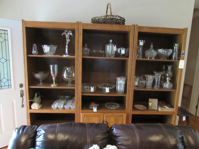 Three piece bookcase, décor as shown