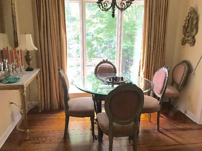Judy Rankin round iron and glass dining table with 6 painted French medallion back chairs