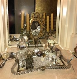 Gilt and marble counter mirror, beautiful collection of perfume bottles on Baccarat tray
