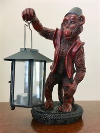 An Organ Grinder's Monkey Lights The Way