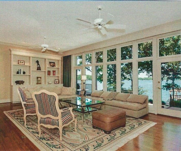 Showing the living room furniture and Oriental rug.