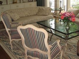 Big Sur Iron Coffee Table with matching lamp table along with Drexel-Heritage French arm chairs. In the background is sofa by Bernhardt.