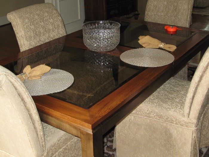 Moden Glass-Topped Dining Room Table with 4 chairs.