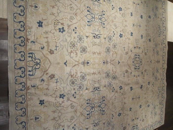 A fine hand knotted rug 8' x 9'.
