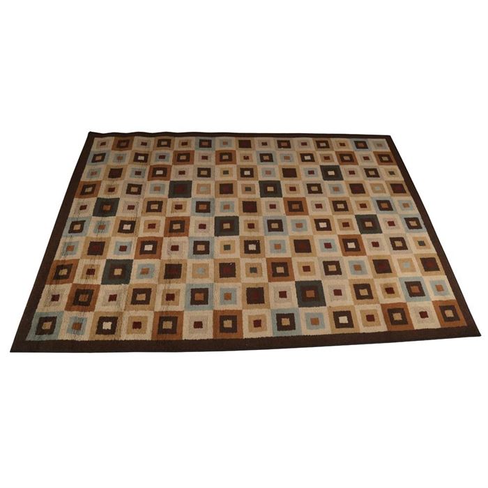 "Modern Squares" Machine Made Area Rug: A machine made area rug. The rug is in the Modern Squares design and is in the “Dunbar Brown” color scheme. The rug was made in the United States and is constructed of 100% polypropylene.