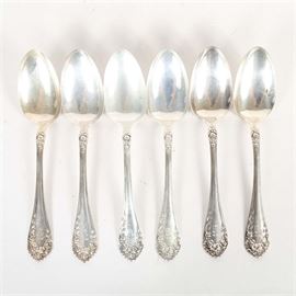 Wallace "Rose" Sterling Silver Serving Spoons: A set of six serving spoons. The spoons are made of sterling silver and were made by Wallace as indicated by the hallmark present to each spoon. The spoons are in the Rose pattern which was made during the 1800s. The combined weight for the six spoons is 10.70 ozt.