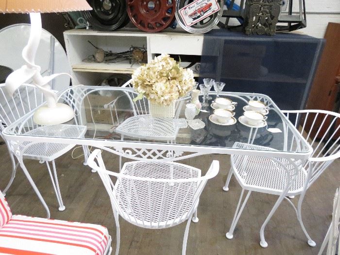 Vintage Woodard patio dining set.  Rectangular glass top table with 4 chairs powder coated in a snow white finish.  Excellent condition.