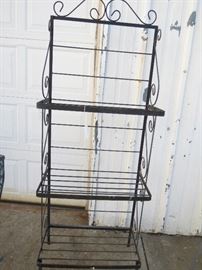 Bakers Rack/plant stand original condition.  Nice patina in black.