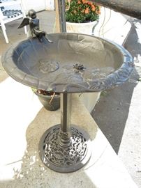 Cast iron base and cast aluminum bowl bird bath restored in a bronze powder coated finish.  Fabulous garden accent. 
