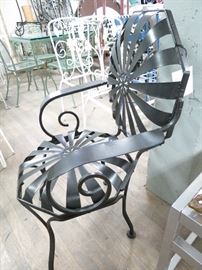 Francois Carre pinwheel arm chair in satin black.  Good condition.